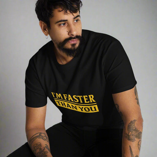 man sitting wearing a black t-shirt that says I'm Faster Than You in gold