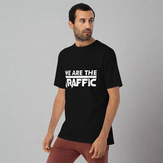 Man wearing black tshirt with white logo