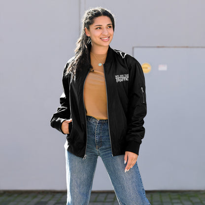 Female wearing black bomber jacket