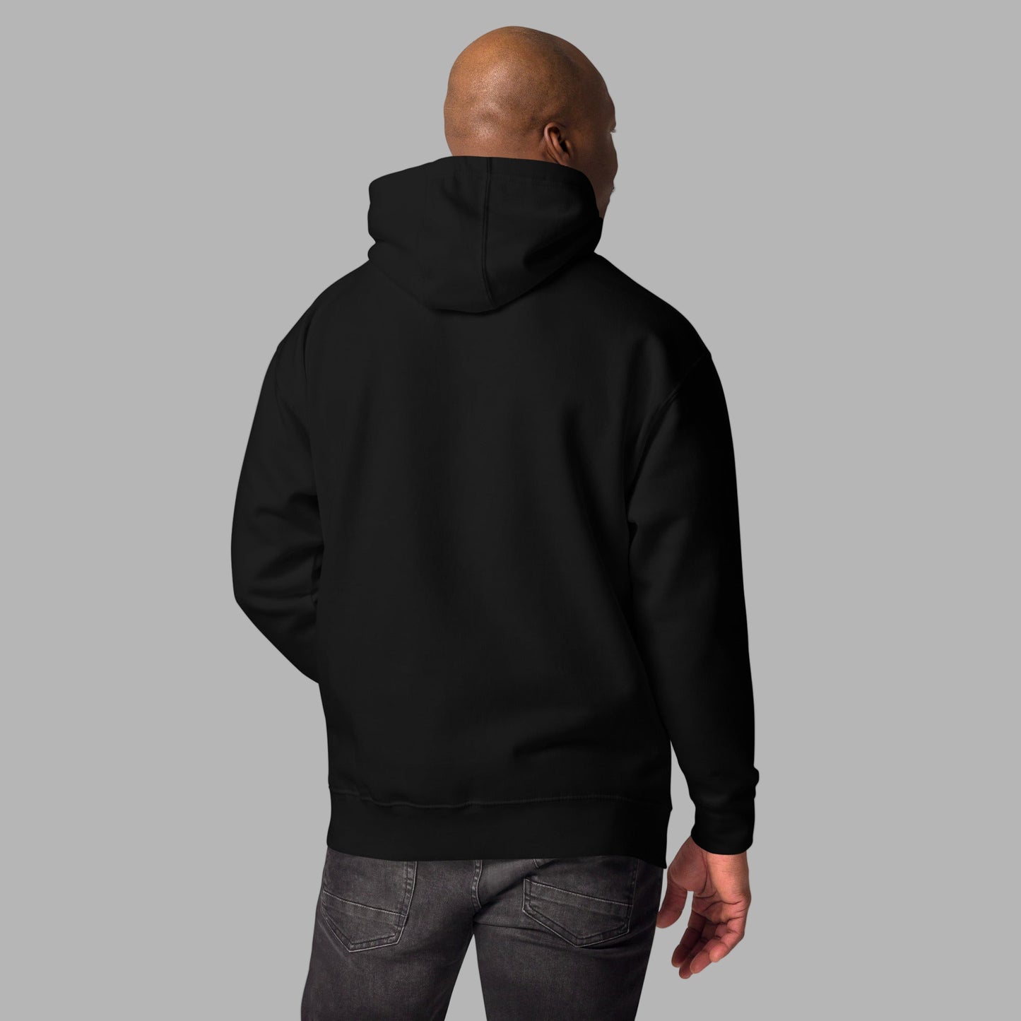man facing backwards to show off the plain back of the IG Famous black hoodie