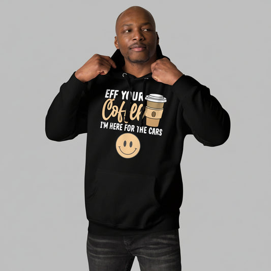 Person wearing a black hoodie with a humorous coffee-themed design on a white background