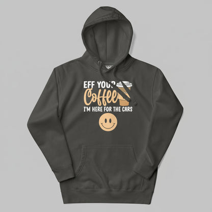 Dark gray hoodie with a humorous cars and coffe quote with a smiley face on a gray background