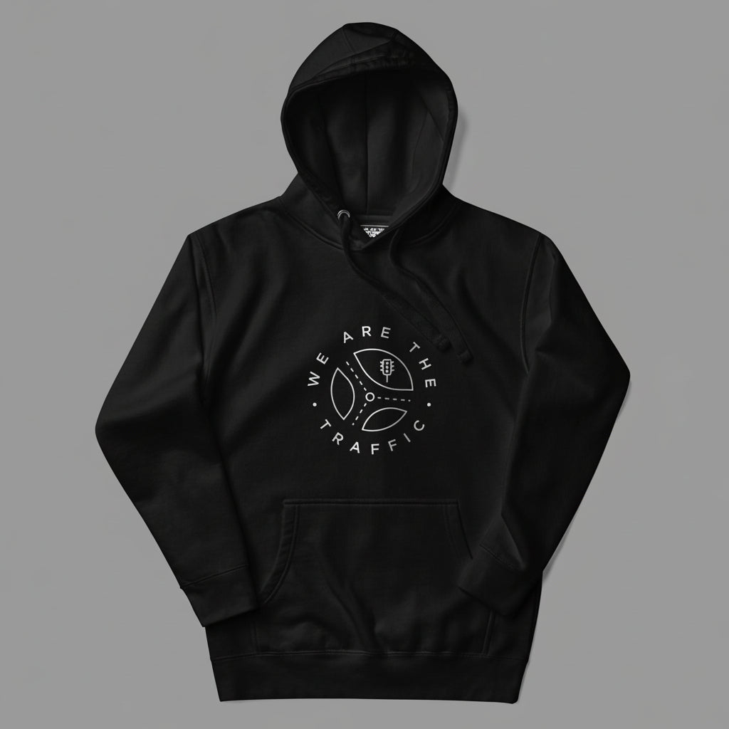 Black hoodie with 'We Are The Traffic' logo on a gray background