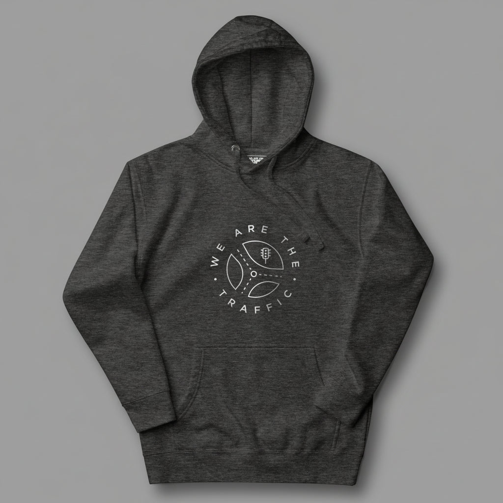Dark gray hoodie with 'We Are The Traffic' logo on a gray background