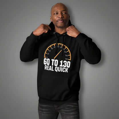 Man wearing a black hoodie with a speedometer and car slogan "60 to 130 real quick" 