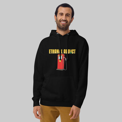 Person wearing a black hoodie with a ethanol pump design and text "ethanol addict" on a gray background
