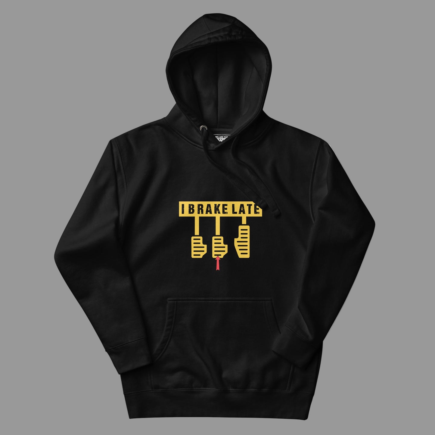 Black hoodie with yellow graphic design on a gray background
