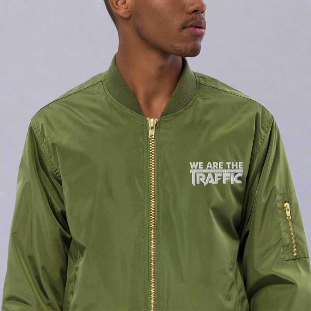 closeup of man wearing green bomber jacket