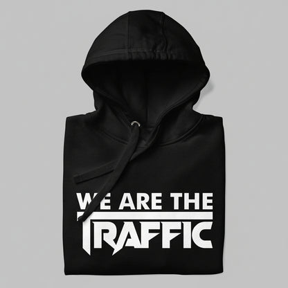 Black hoodie with 'WE ARE THE TRAFFIC' text on a gray background