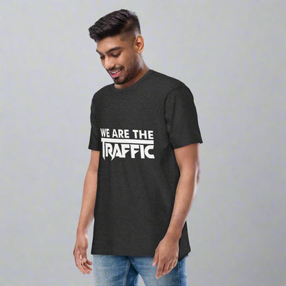 Man wearing charcoal gray t-shirt with white logo
