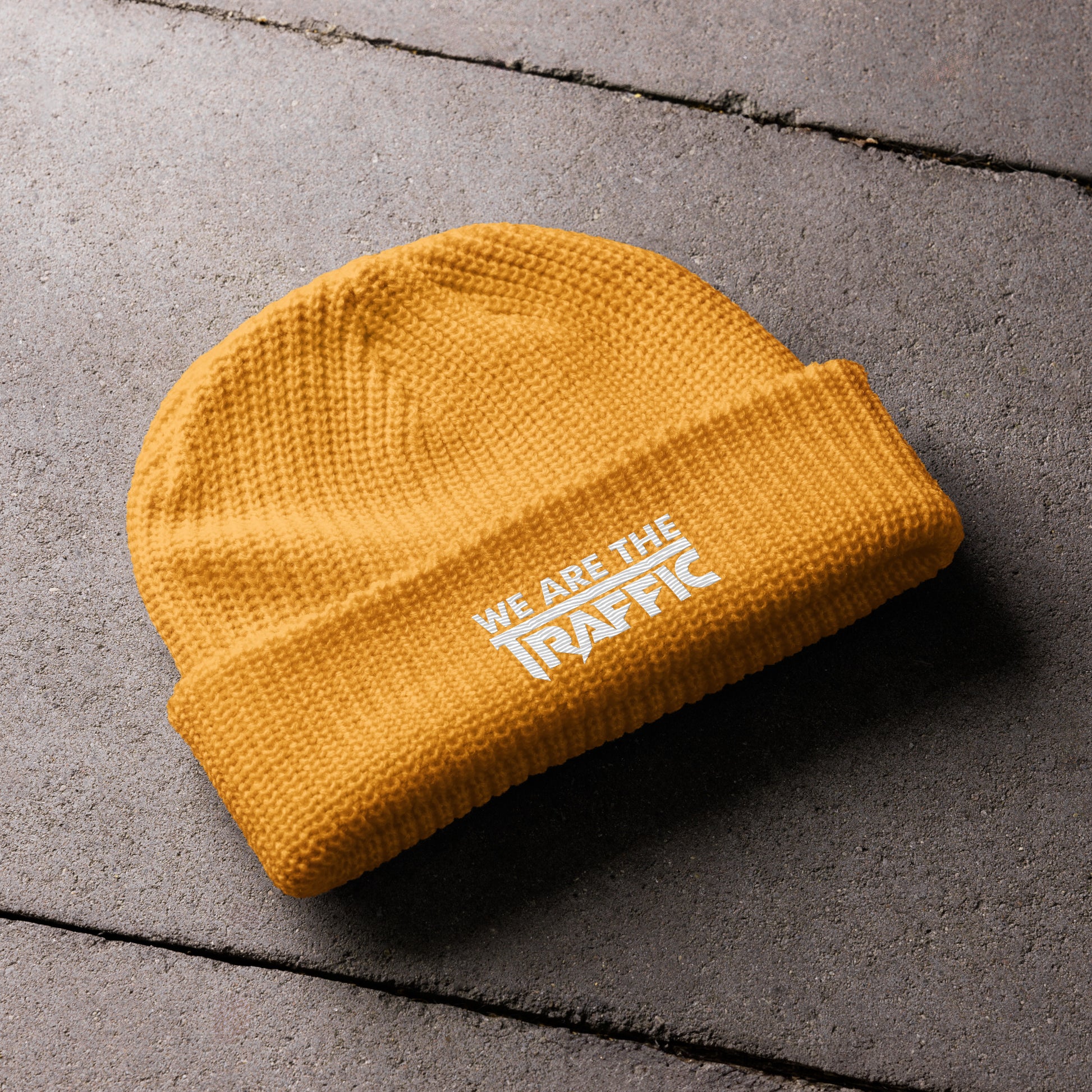 yellow knit beanie with logo